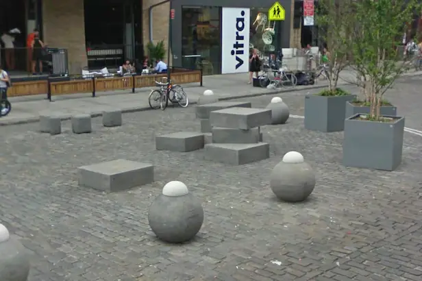 Avert thy gaze away from these hideous simulacrums. The "boobs" at Ninth Ave &amp; 13th Street